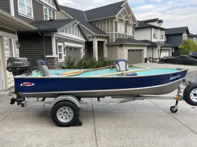 LUND S-14 FOOT ALUMINUM BOAT with 30 HP NISSAN OUTBOARD - Lund S-14 “Big Fisherman” with 20 inch tra...