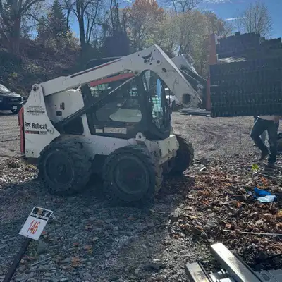 2013 bobcat With multiple attachments, brand new run flat tires, an extra set of rubber tires, Forkl...