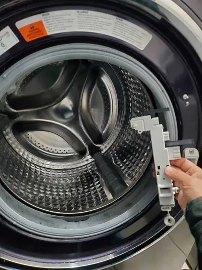 Appliance repair - washer repair with door latch issue, View more