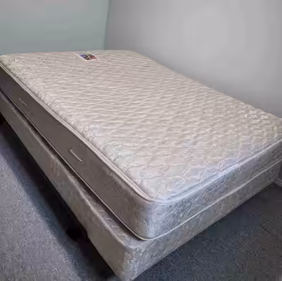 Queen sized mattress with mattress box included. Good, used condition. Less than 10 years old, and n...