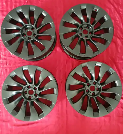 For sale is a set of OEM Tesla Uber Turbine rims. The wheels are brand new, they DO NOT come with ce...