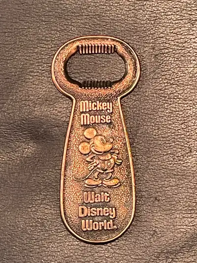 Here's a nostalgic piece for the Disney enthusiast: a vintage brass Mickey Mouse Walt Disney World b...
