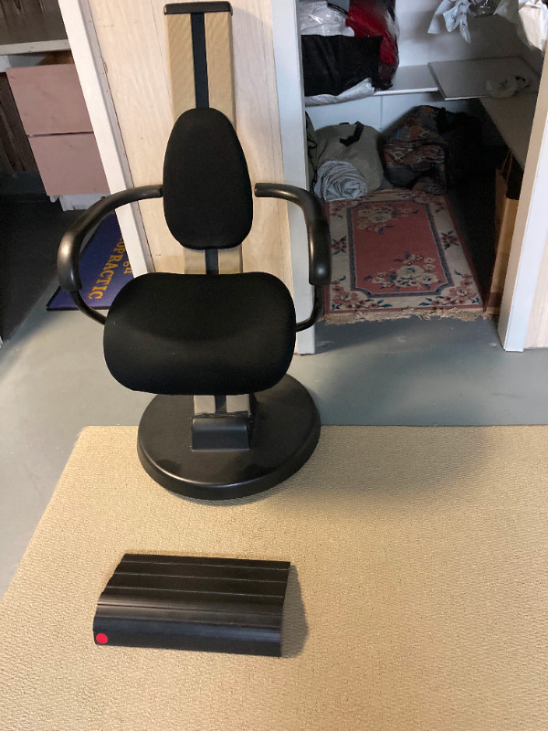 MCM tilting chair! It tilts forward to support your lower back