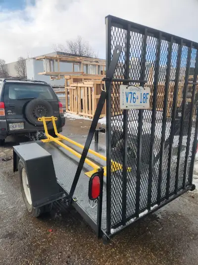 Brand new Custom built heavy duty Yellow ramp come off and can be used at flat trailer Please contac...