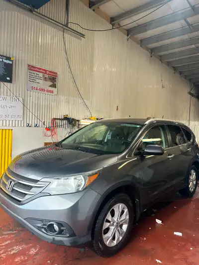 This well-maintained vehicle is in great condition inside and out. It features premium leather seats...