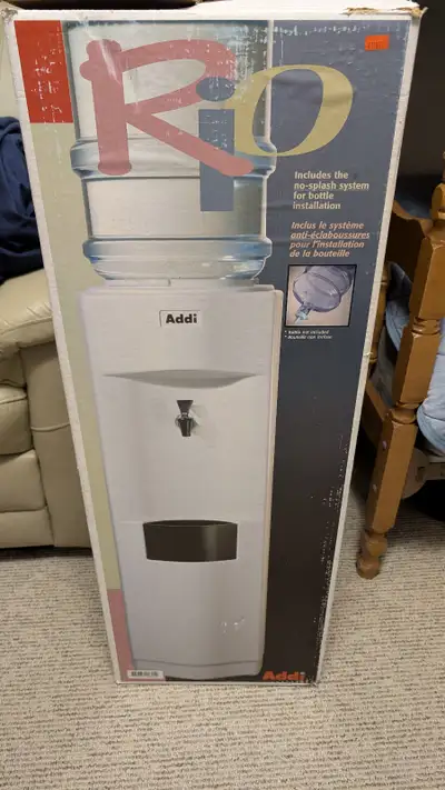 FS: Like NEW Water Cooler w two 18.9L bottles included!, View more