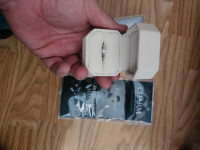 Engagement ring paid $630. For it. Lifetime warranty with 1 or 2
