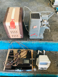 2 VINTAGE REGULAR 8 MOVIE PROJECTORS