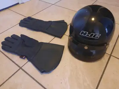 Blacj]k motorcycle helmet and gloves