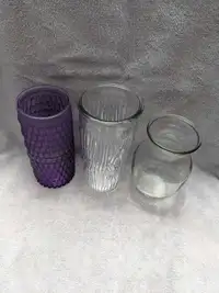 Two clear glass Flower vases (purple sold)