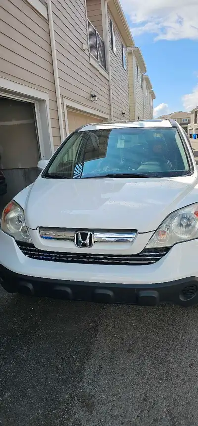 (Rebuilt Status) due to minor accident and change new front bumper Fully loaded AWD CRV EXL. Have Re...
