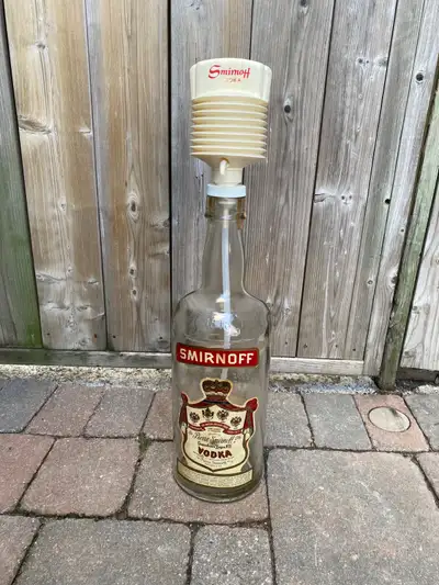 Big boy Texas Mickey Smirnoff Vodka bottle with plastic spout topper. You can use this for various p...