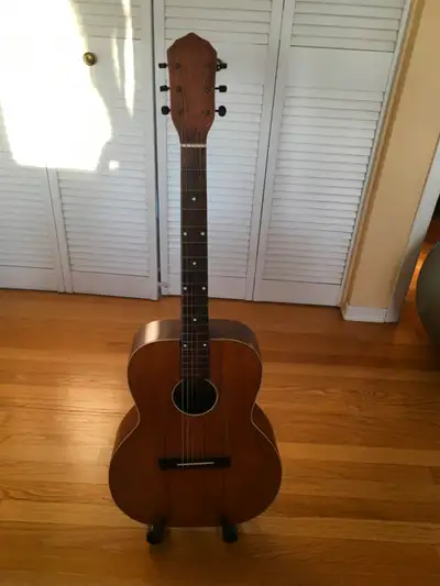 Vintage acoustic guitar, View more