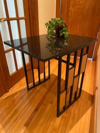 Black Marble  Table with wrought iron frame. 24” X 30”, 28” high