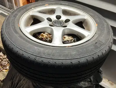 4 Volvo alloy rims with 4 Michelin Primacy MXV4 Radial X All-Season Tires, 195/60R15 88H $40 for all...