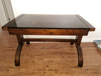 Wooden desk with glass inlay