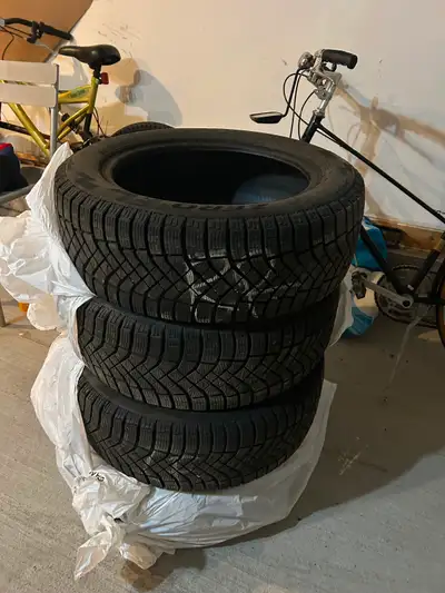 I am selling a set of used Pirelli Winter tires in size 205/55 R16, perfect for navigating through s...
