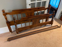 Pine Bed frame with steel rails.