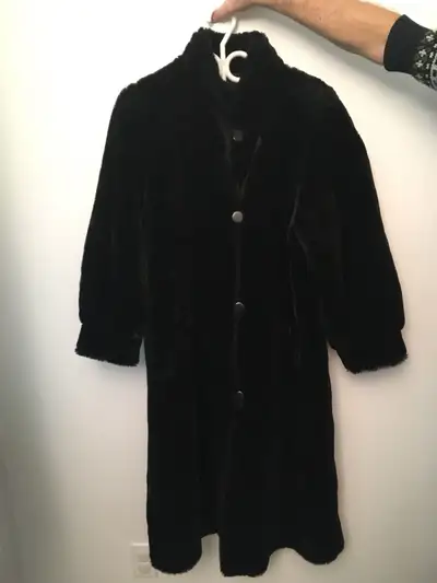 I have a black faux fur (J. Percy for Marvin Richards) winter coat size small. On side is all faux f...
