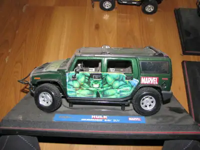 4 Hummer Model Cars 3 are static models (9.5 inches long) H2 Hulk + H2 + H1 1 is a remote vehicle wi...