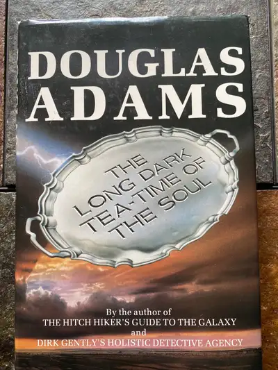 See photo 3 for overview of book. 1988 first Canadian edition by Douglas Adam's (the author of The H...
