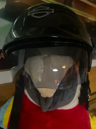 2 Harley Davidson helmets for sale. One has pull down face shield. Very new helmets only worn 2 or 3...