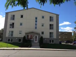 Large 1 bedroom condo with parking. Open concept kitchen with an Island, hardwood in the living room...