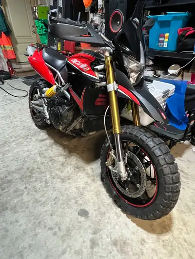 2012 Aprilia 1200 Dorsoduro comes with K&N air filter, SC project dual carbon fibre exhaust sounds a...