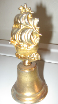 Brass Bell Made in England Ship 5 inches high.