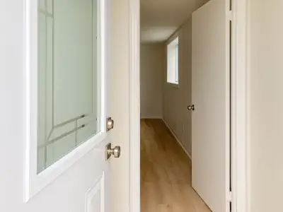 Recently renovated, bright 2-bedroom registered apartment with off street parking. Semi-above ground...