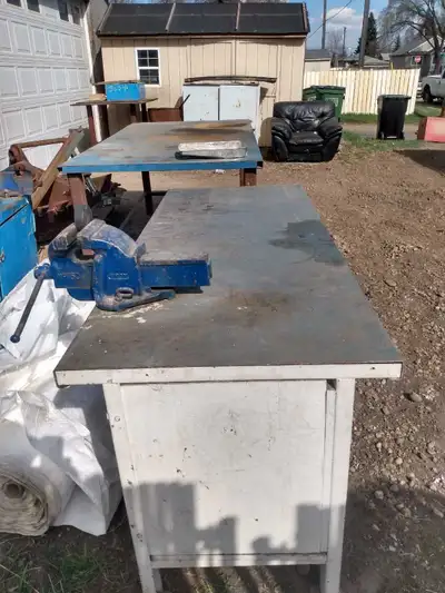 30" deep, still park your car in garage. Heavy duty 8" vise, excellent working condition. Great for...