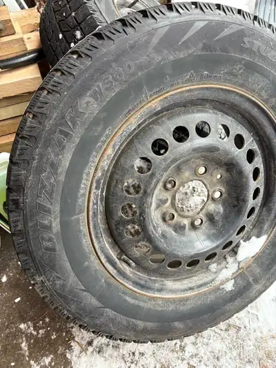 205/70r15 Bridgestone Blizzak snow tires. Tread 9/32 On steel rims Rim 5x114.3 mm $550 obo.