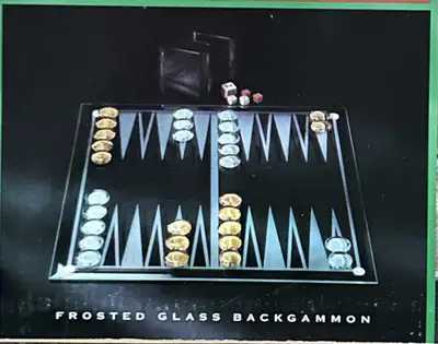 This is a frosted glass backgammon set, perfect for game enthusiasts! The set includes all the piece...
