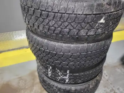4 WINTER TIRES ONLY 225-65-17 GOOD TREAD AND DECENT CONDITION - good for one or 2 seasons asking $12...