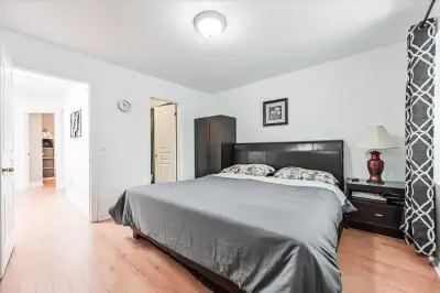 Master Bedroom in a big and spacious house in Toronto (Weston and Eglinton). The room is furnished a...