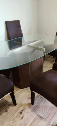 Glass top dinning table with 6 chairs