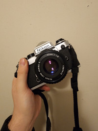 Nikon FE + 50mm 1.8 28mm 2.5 camera bag and tripod 35mm slr film