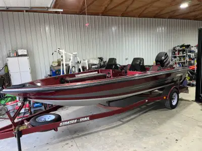 I'm selling a used Stratos 19 1/2 foot boat, perfect for fishing and cruising, complete with a Johns...