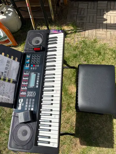 Selling for a friend ROCKJAM keyboard and bench, View more