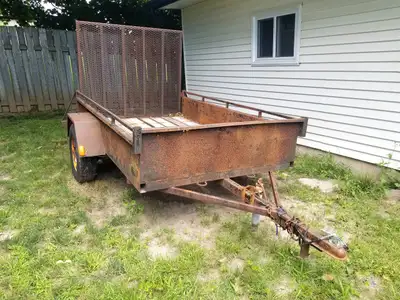 5x8 Utility Trailer 2" ball -still in use, tows down the highway well but looks rough -could use som...