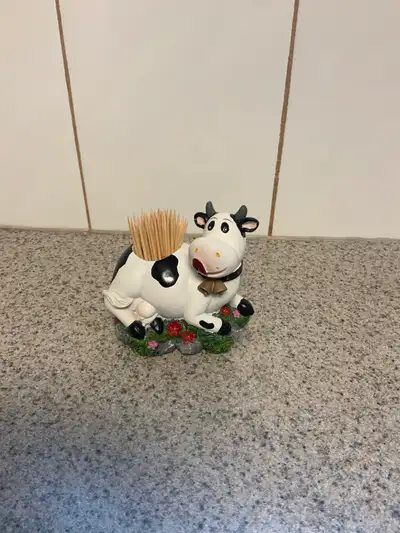 SW Woodlands I am downsizing my cow collection and I have a Holstein Cow Toothpick Holder for sale....