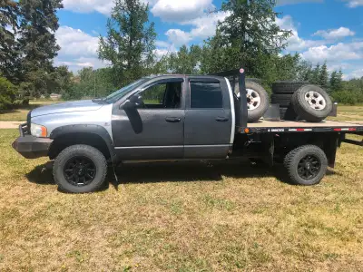 2003 Dodge Ram 3500, with deck and hidden 5th wheel and rear hitch. Recent windshield, front wheel b...