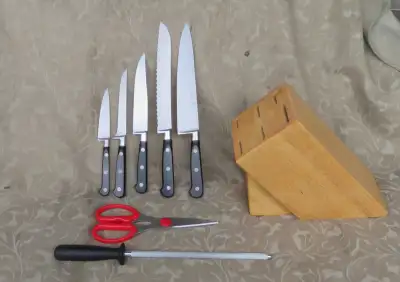For sale J.A. Henckels International 9pc set-6 knifes, sharpener, scissors and wooden block (made in...