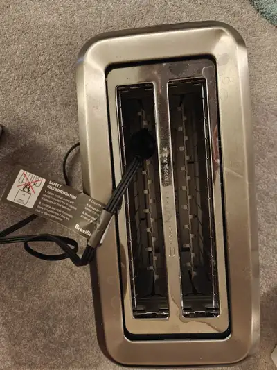 3 toasters, one Breville never taken out of the box, View more
