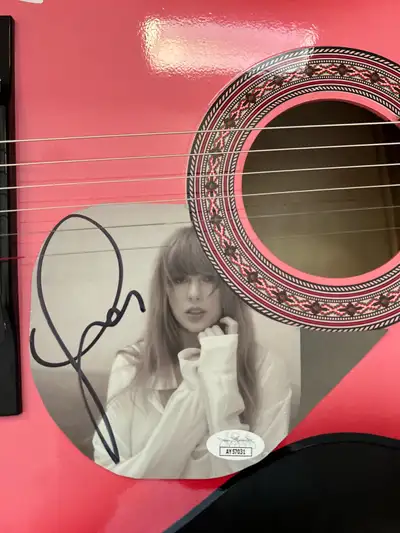 Taylor Swift signed guitar with JSA COA , View more