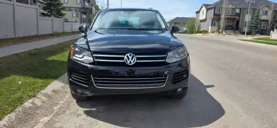 Selling my Touareg TDI, owned for a bit over two years. Active, Clean abstract Alberta registration...