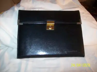 I have a portfolio organizer size 12 inches wide x 9 inches high, for $5.00.