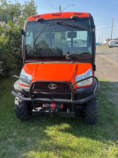 2024 Kubota RTV X1100C Diesel Full Cab heat / AC hydraulic dump box. Rear window protector. Warranty...