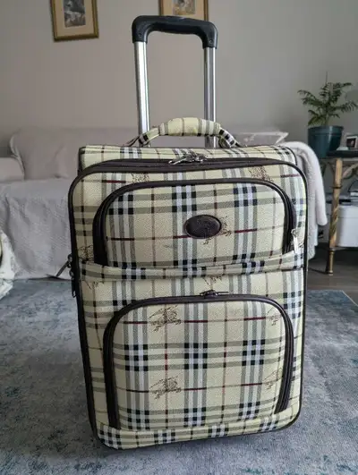 Burberry suitcase , View more