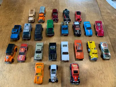 Selling a great lot of 24 authentic Hot Wheels cars, featuring classic models from the 1970s to 1990...